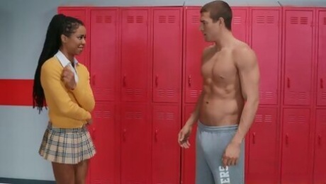 A white skinned bad boy fucks a sweet black college girl in the locker room